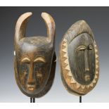 Ivory Coast, Yaure, small mask with horns and Baule a small mask.