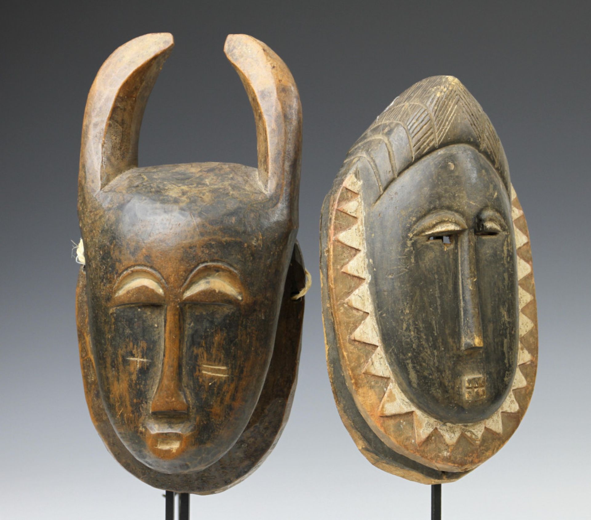 Ivory Coast, Yaure, small mask with horns and Baule a small mask.