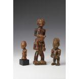Three decorative Congo figures.