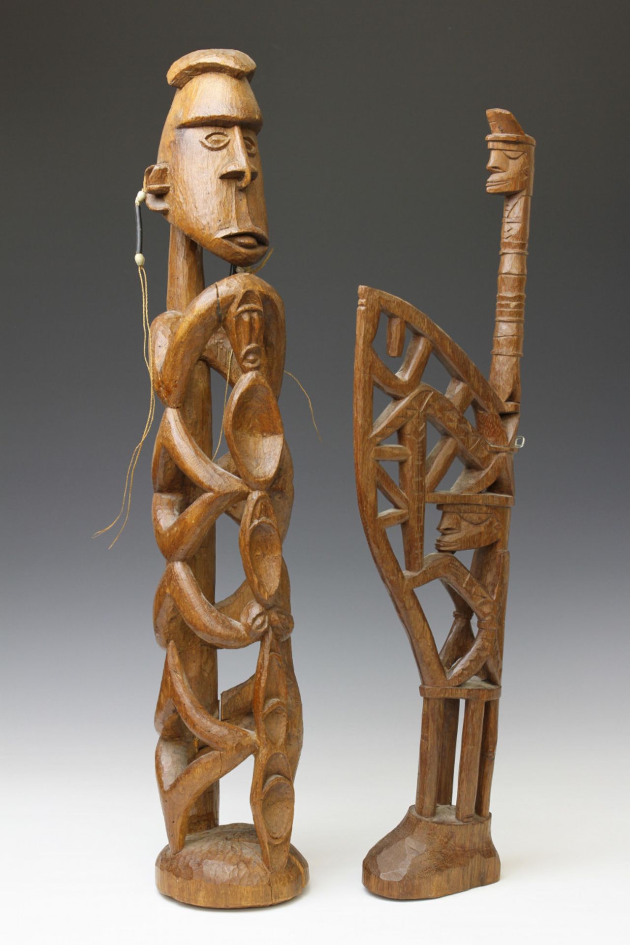 Papua, Asmat, open worked ancestor figure and a Kamoro figure