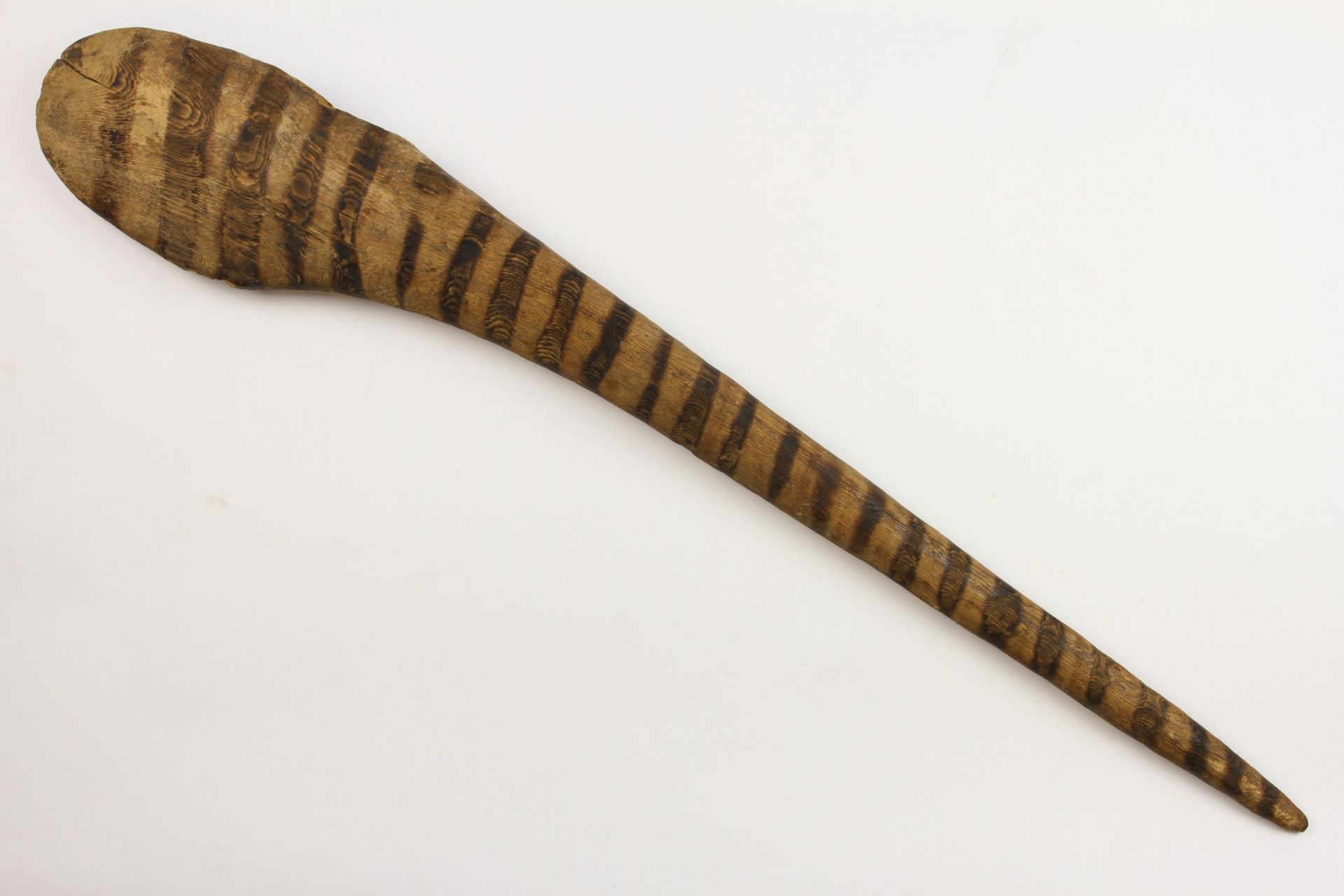 Papua, an axe with wooden and pyrochraphed handle and a wooden adz, - Image 4 of 6