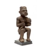 Cameroon, Bamileke, seated male figure,