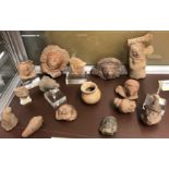 A collection of various South American Pre Columbian eartheware artefacts,