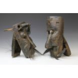 Indonesia, two masks with movable lower jaw, plant fibre moustage and eyebrows