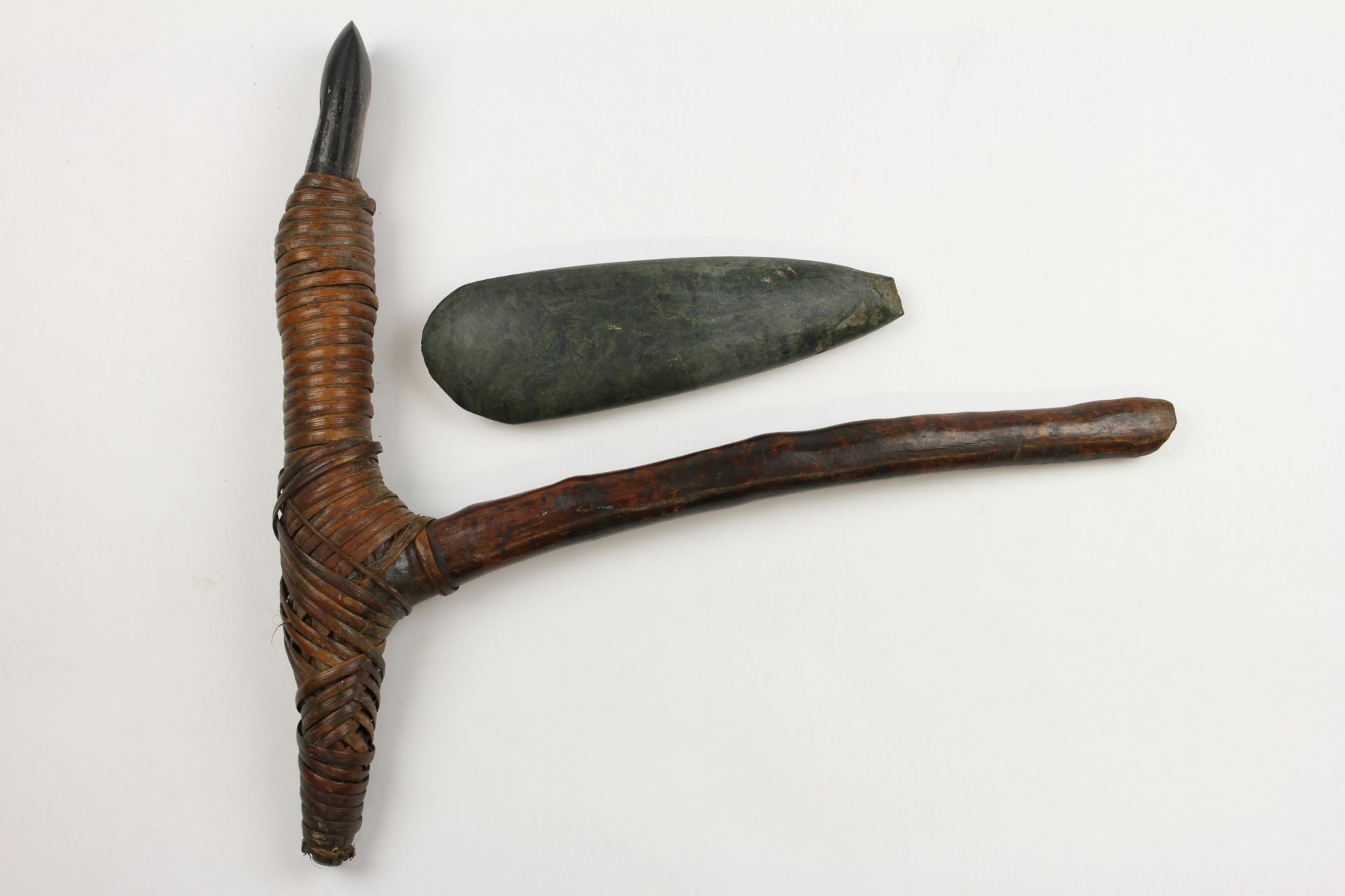 Papua, an axe with wooden and pyrochraphed handle and a wooden adz, - Image 6 of 6