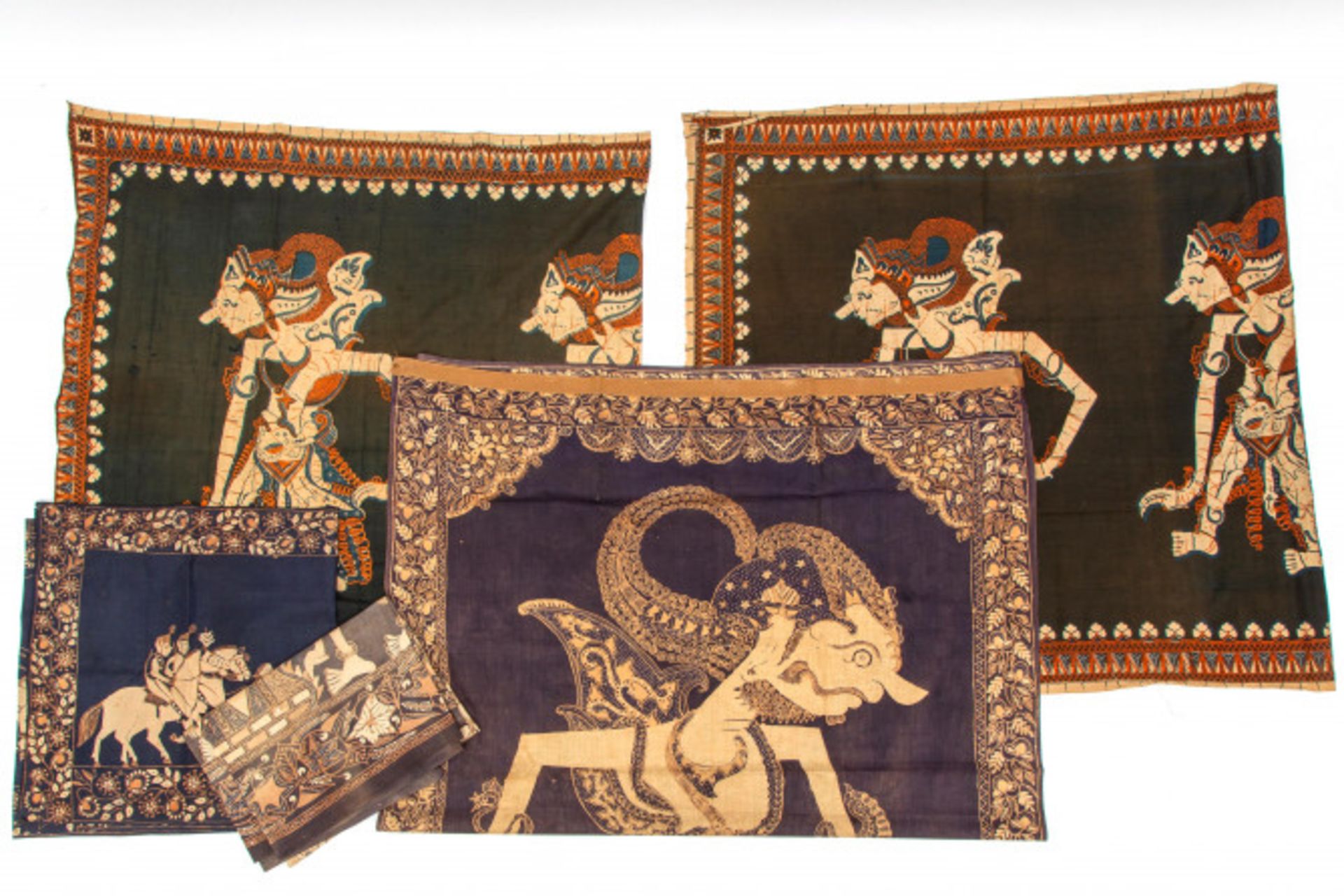 A collection of five batiks with wajang figures.