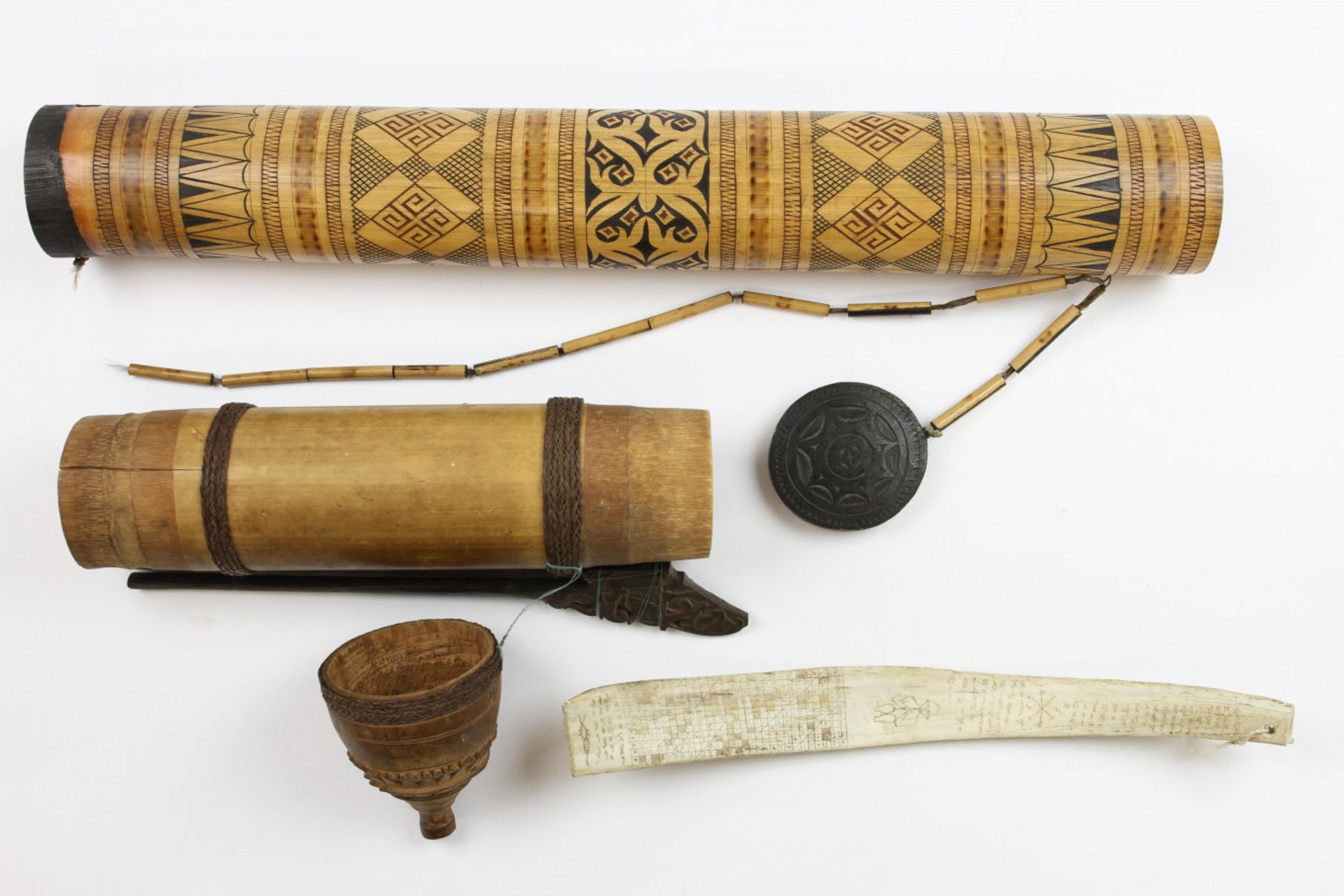A Dayak bamboo quiver, a Sulawesi bamboo decorated container and a Batak, carved water buffaloo manu - Image 5 of 8