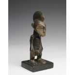 Senufo, small standing male figure, tuguble,