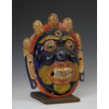 Buthan, beschilderd demonen masker