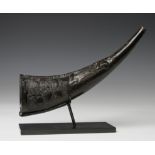 Sumatra Toba Batak, carved buffalo horn powder horn, ca. 1900.