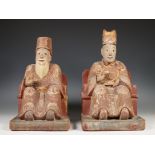 China, paar houten sculpturen;