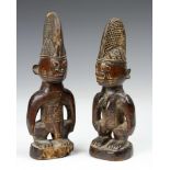 Nigeria, Yoruba, two pair of Ibeji figures.