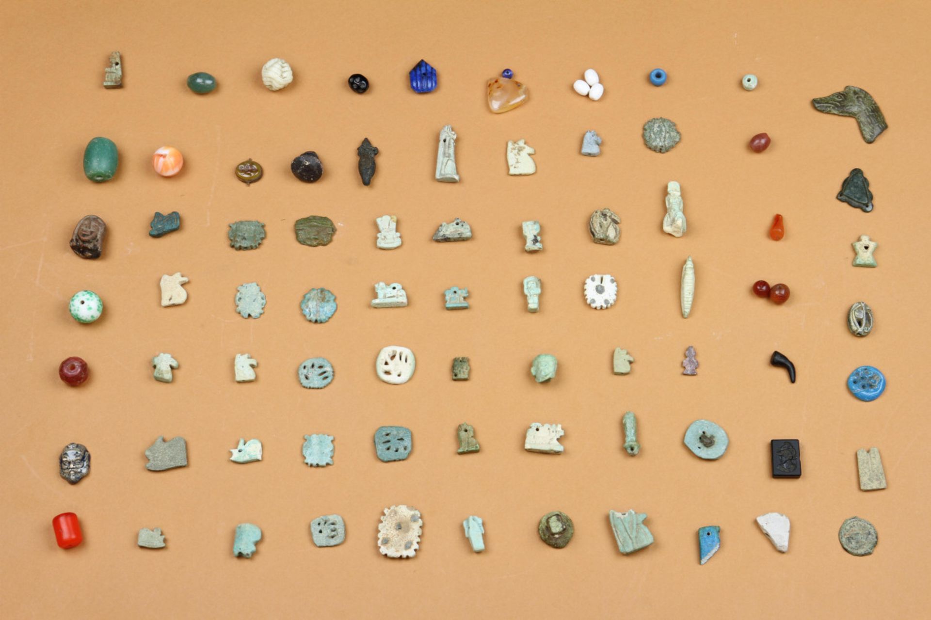 A collection of Egypt faience amulets, Late Period.