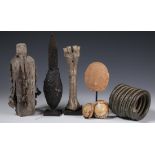 Namibia, Ovampo, two ivory and seven conus shell ornaments, ekipa; an Akan terracotta funerary head;