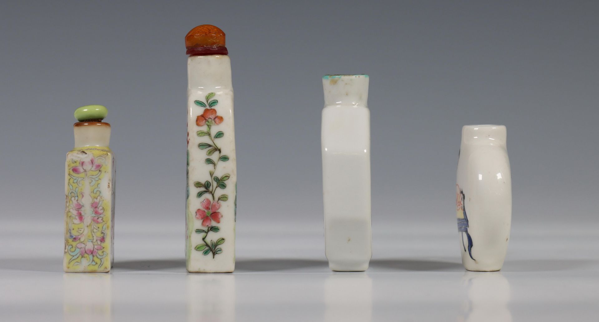 China, four figural porcelain snuff bottles, one decorated with figures in a garden, one with erotic - Image 3 of 4