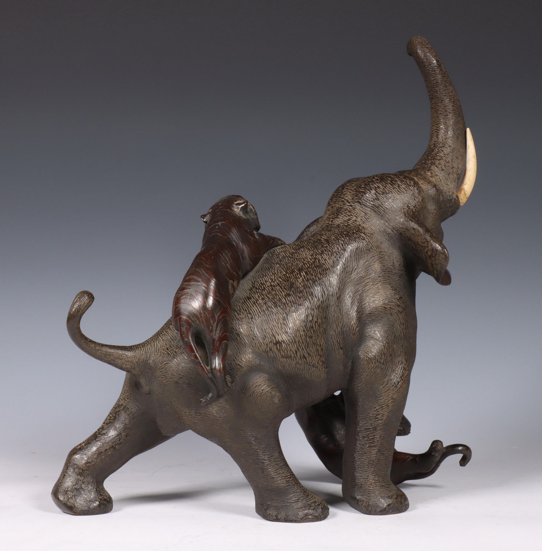 Japan, bronze sculpture of an elephant, 19th/early 20th century, the animal being attacked by two - Image 3 of 5