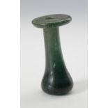 Islamic thick green glass bottle, ca. 12th-15th century.