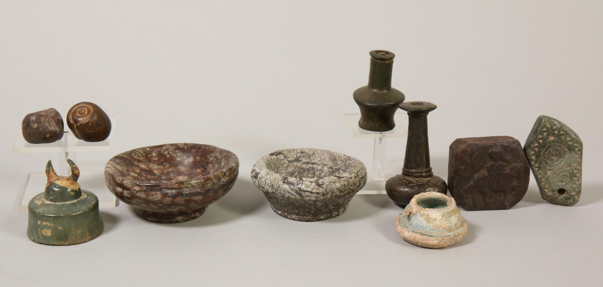 A collection of various objects, some antique;