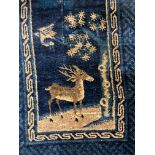 China/Tibet, blauw wollen handgeknoopt tapijt, ca 1900,