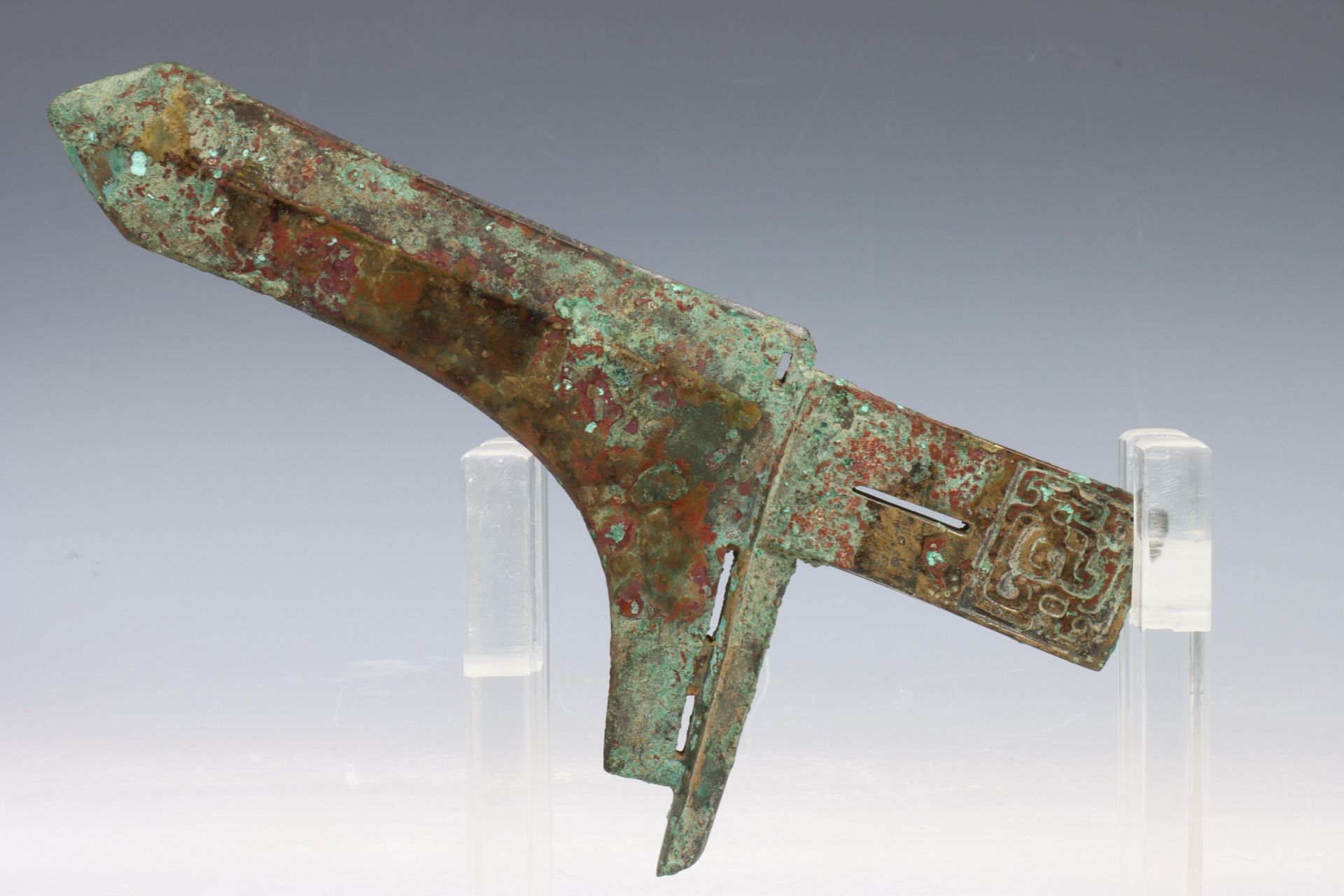 China, bronze axe, probably Eastern Zhou dynasty, the rectangular handle cast with stylised - Image 3 of 6