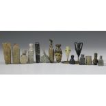 A collection of fifteen glass and stone small bottles;