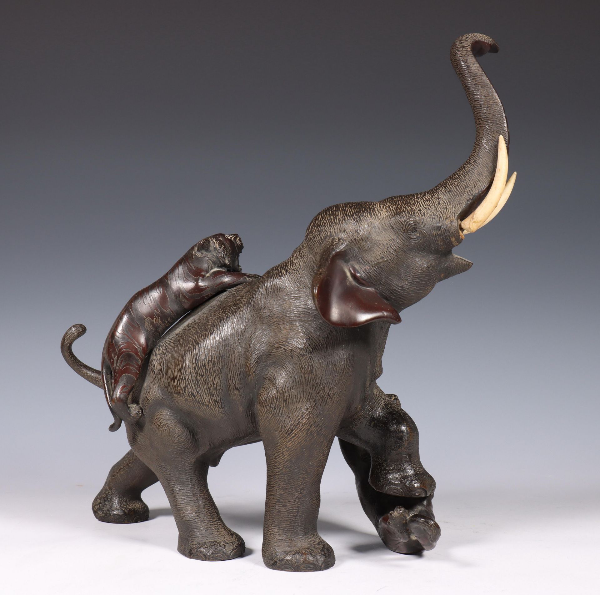 Japan, bronze sculpture of an elephant, 19th/early 20th century, the animal being attacked by two - Image 4 of 5