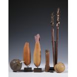 Melanesia, Santa Cruz, two lime gourds, P.N. Guinea, a coconut shell penis sheath, a Massim miniatur