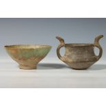 Persian faience bowl, 13th century and Near Eastern antique black earthenware bowl with two handles,