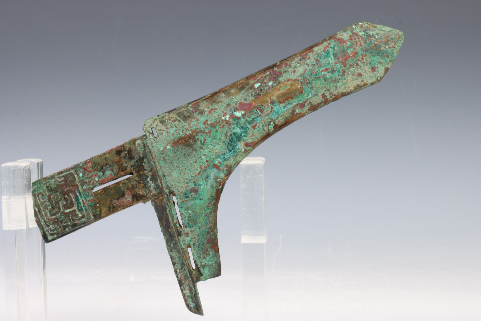 China, bronze axe, probably Eastern Zhou dynasty, the rectangular handle cast with stylised - Image 4 of 6