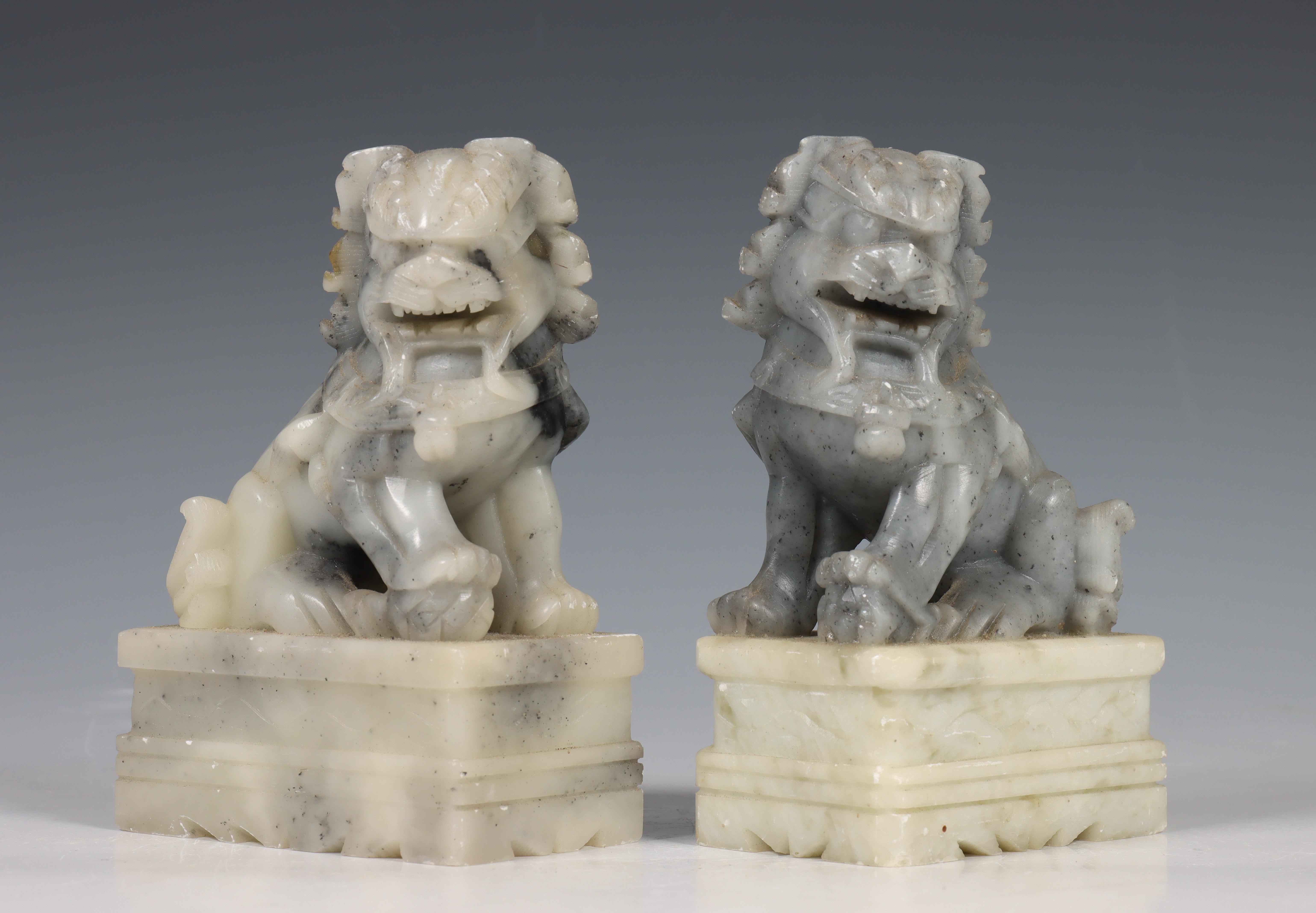 China, two soapstone temple lions and a seal, 19th/20th century, the temple lions decorated in - Image 10 of 12