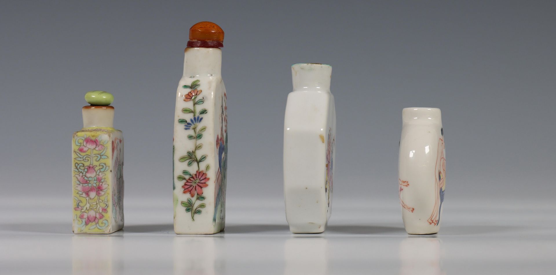 China, four figural porcelain snuff bottles, one decorated with figures in a garden, one with erotic - Image 2 of 4