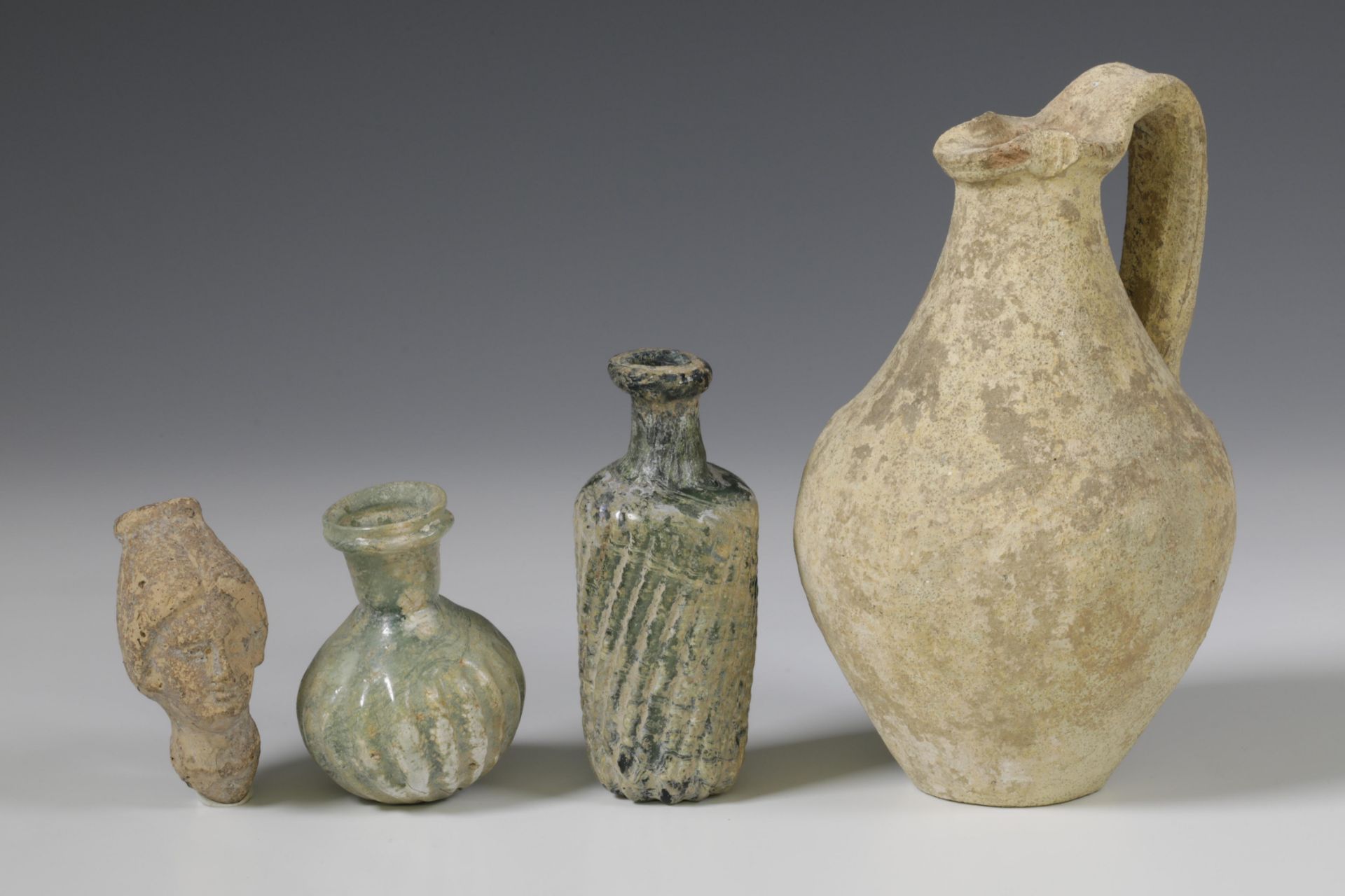 Two Roman glass bottles and a terracotta flask, 2nd-3rd century. - Image 2 of 3