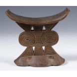 Zimbabwe, Shona, headrest, carved with geometric lines and partly openworked