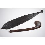 S.E. Australia, Aborigine, boomerang or club with notched patterns; herewith a spear thrower.