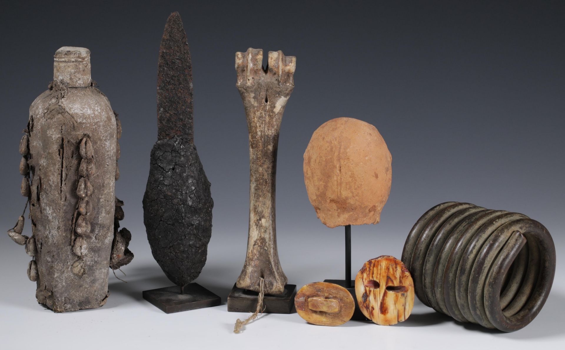 Namibia, Ovampo, two ivory and seven conus shell ornaments, ekipa; an Akan terracotta funerary head; - Image 2 of 2