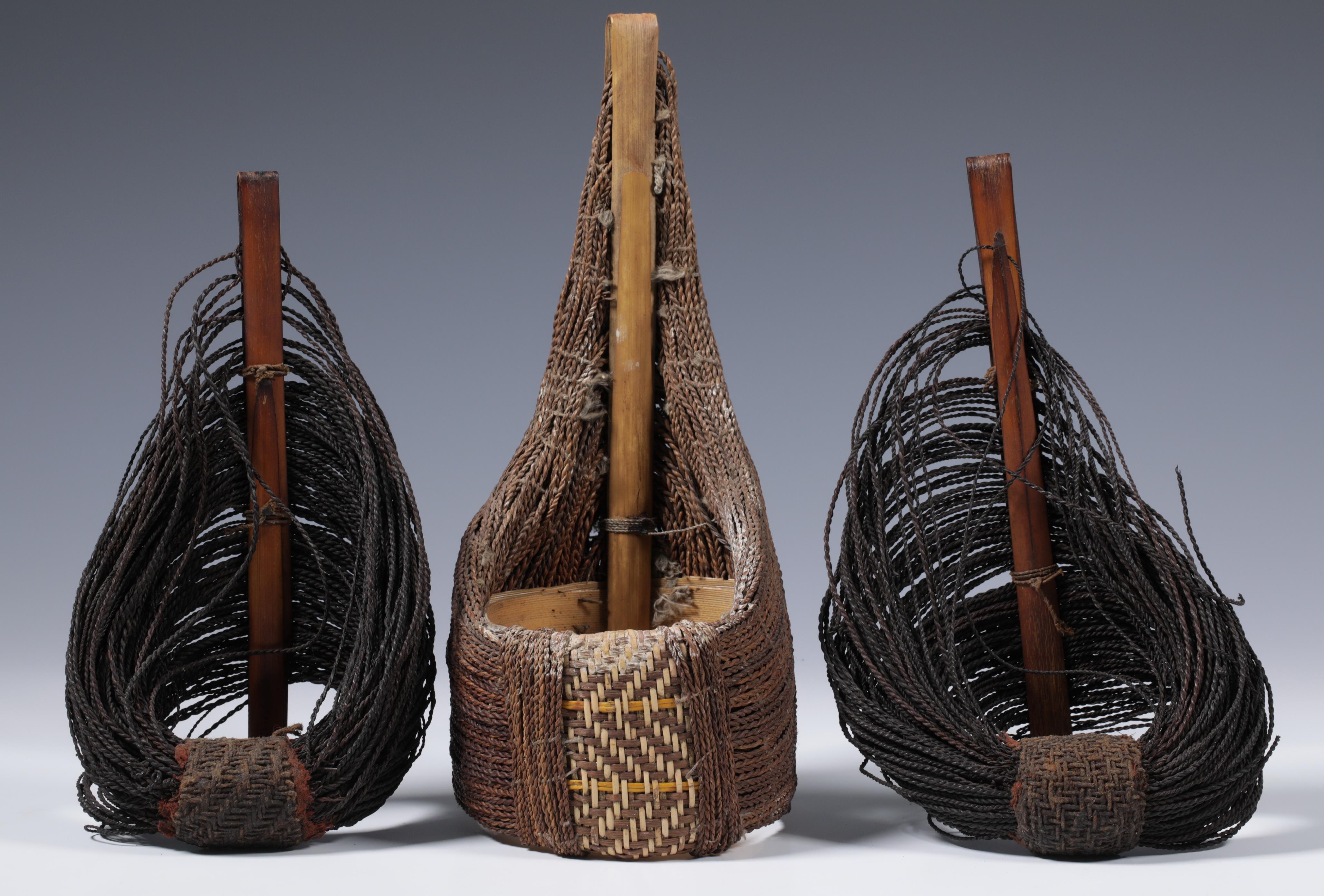 P.N. Guinea, Mendi, a pair of man's armlets, sekip, engraved bamboo and plant fibre cords; and anoth