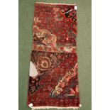 Fragment van antiek Perzisch kleed,