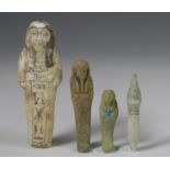 Egypt, three terracotta Ushabti's and an amulet, Late Period;