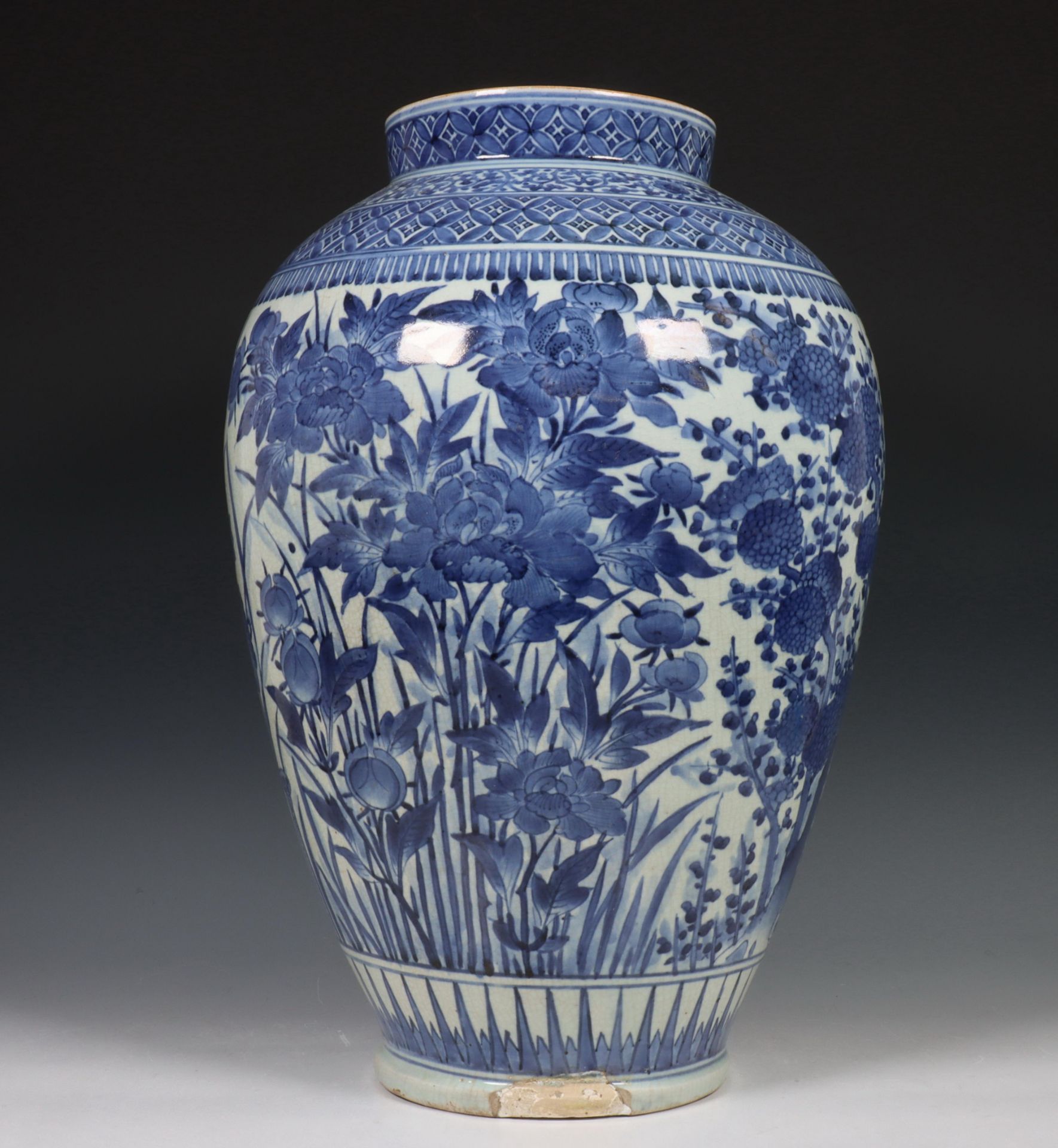 Japan, blue and white porcelain baluster vase, Meiji period, 19th century, decorated with prunus,