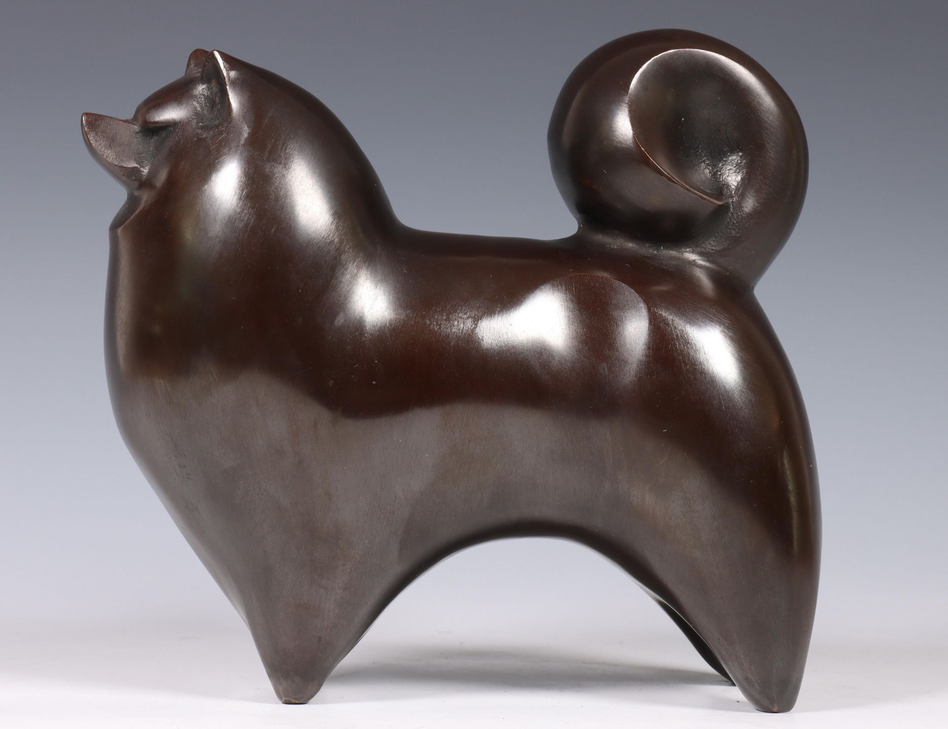 Japan, Saegusa Soutarou (1911-2006), bronze okimono of a stylised Akita dog, signed, including