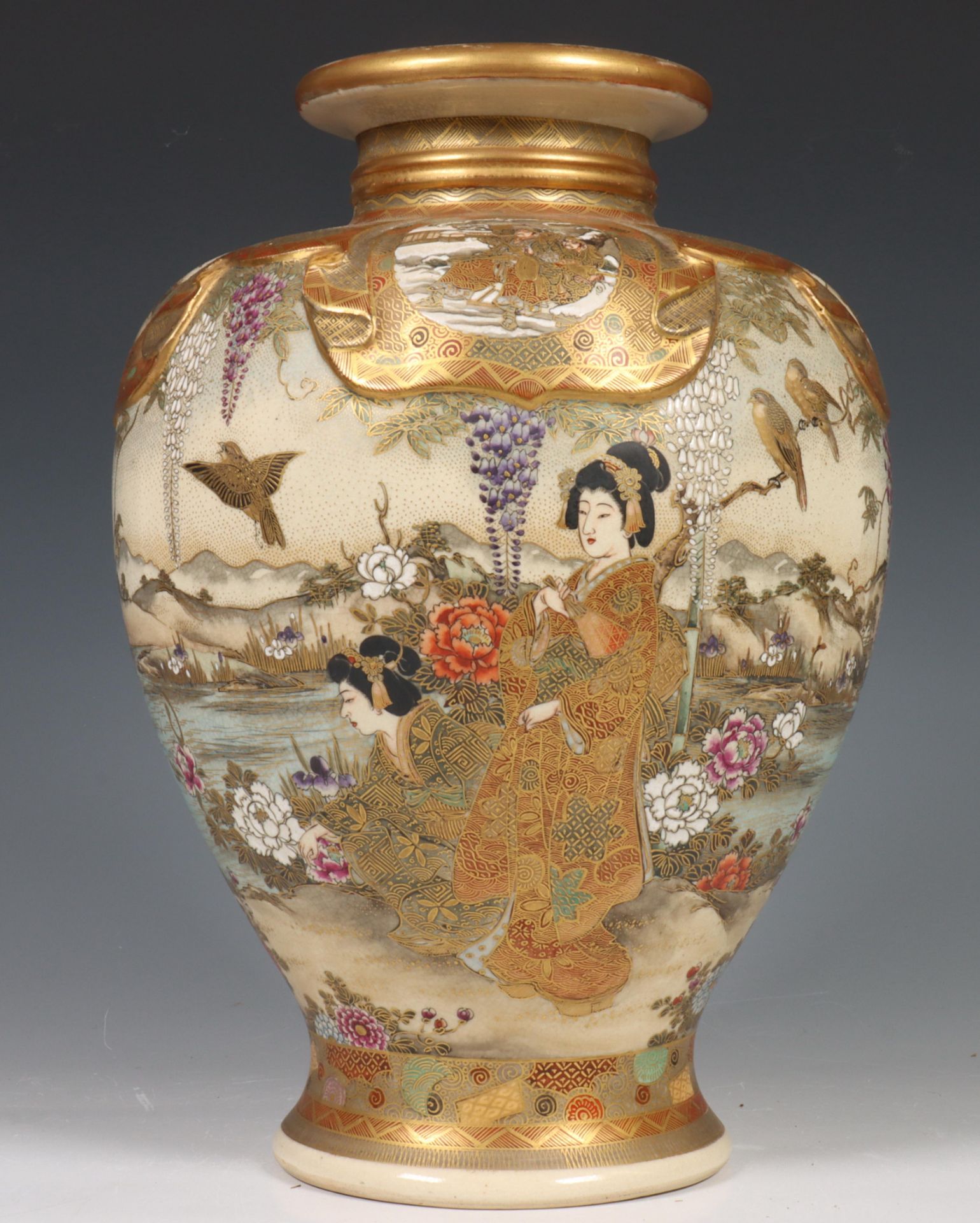 Japan, Satsuma porcelain vase, late 19th century, decorated with elegant ladies in a flower garden