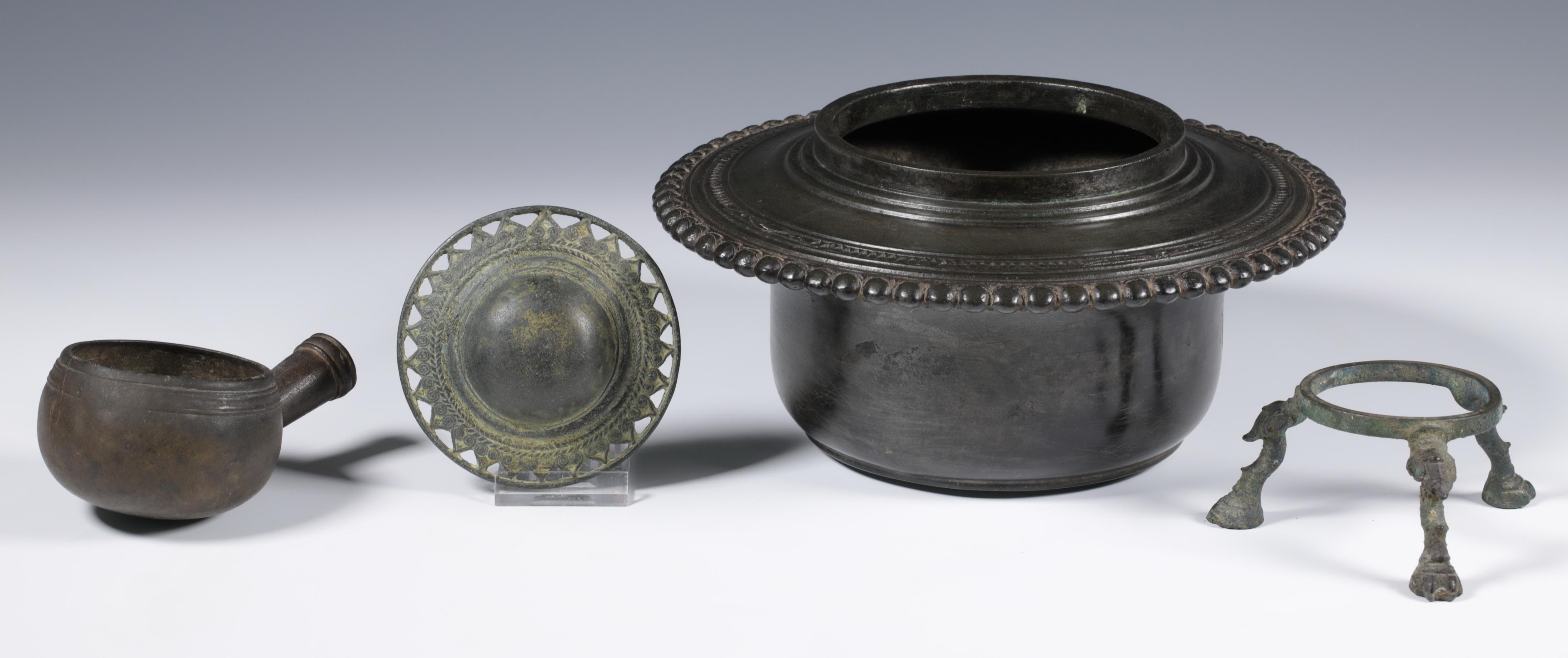 Java, a bronze East-Javanese period style holy water container; herewith a bronze buckle, a scoop an