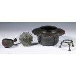 Java, a bronze East-Javanese period style holy water container; herewith a bronze buckle, a scoop an