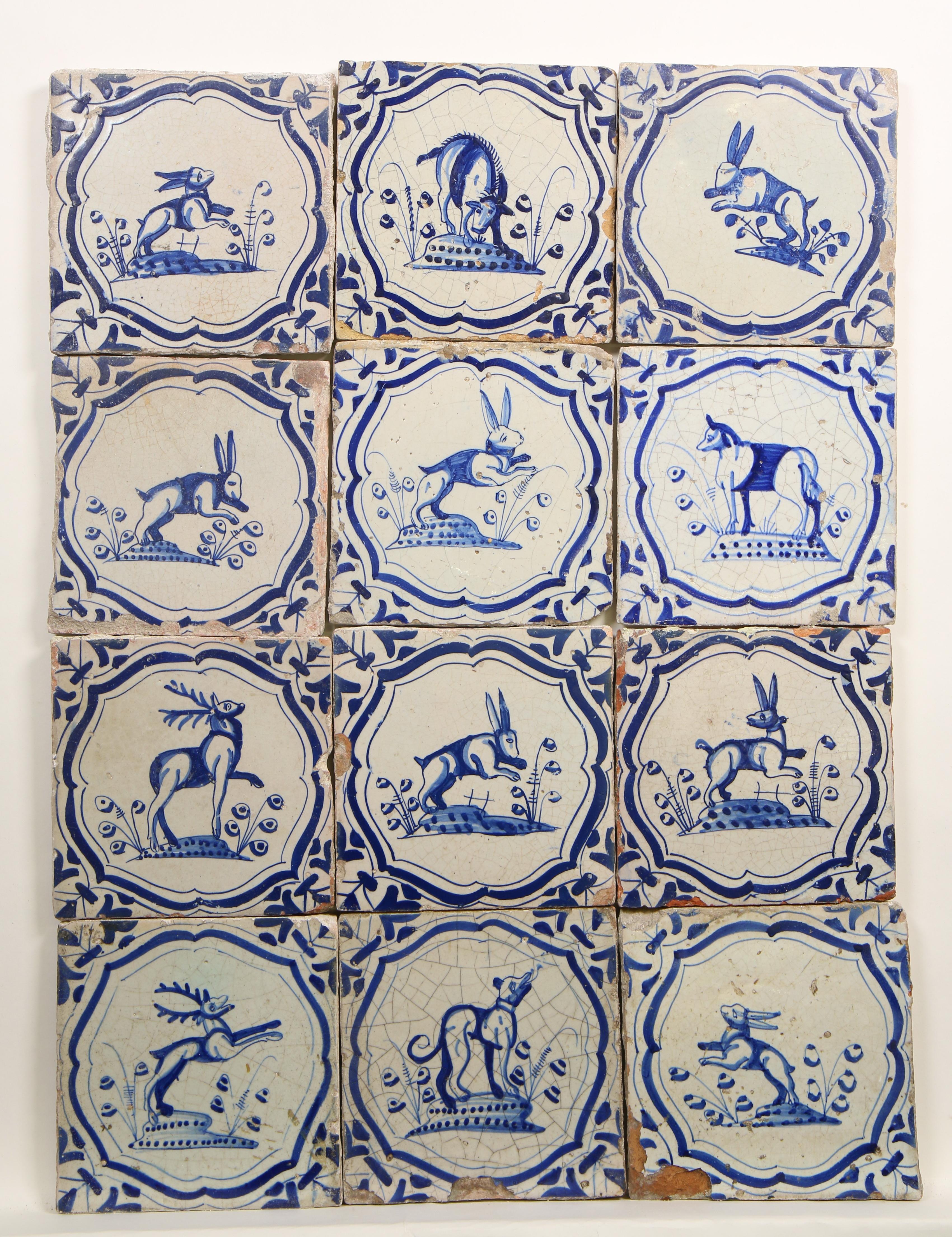 Twaalf blauw aardewerk dierendecor tegels, 1625-1650,
