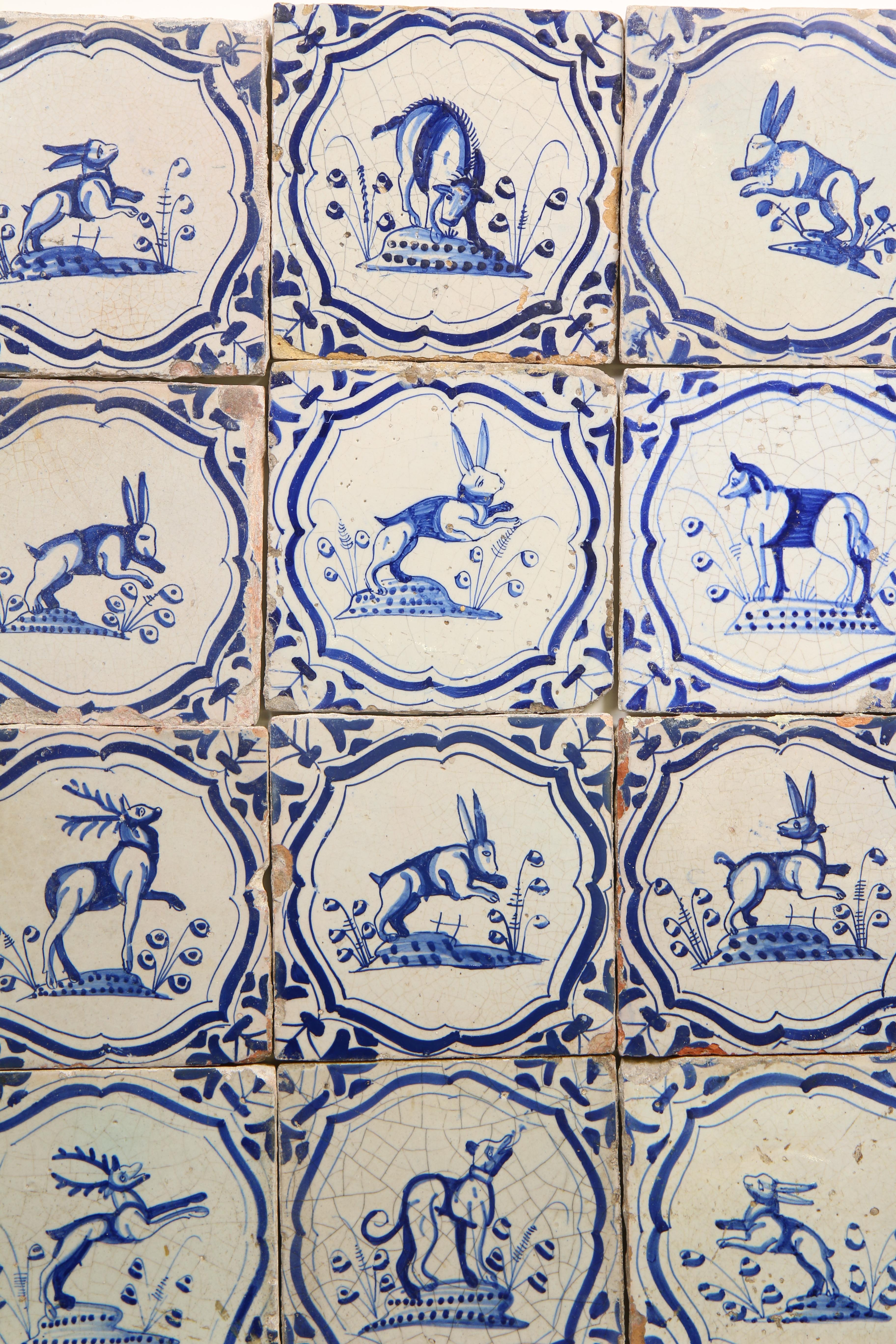 Twaalf blauw aardewerk dierendecor tegels, 1625-1650, - Image 2 of 3