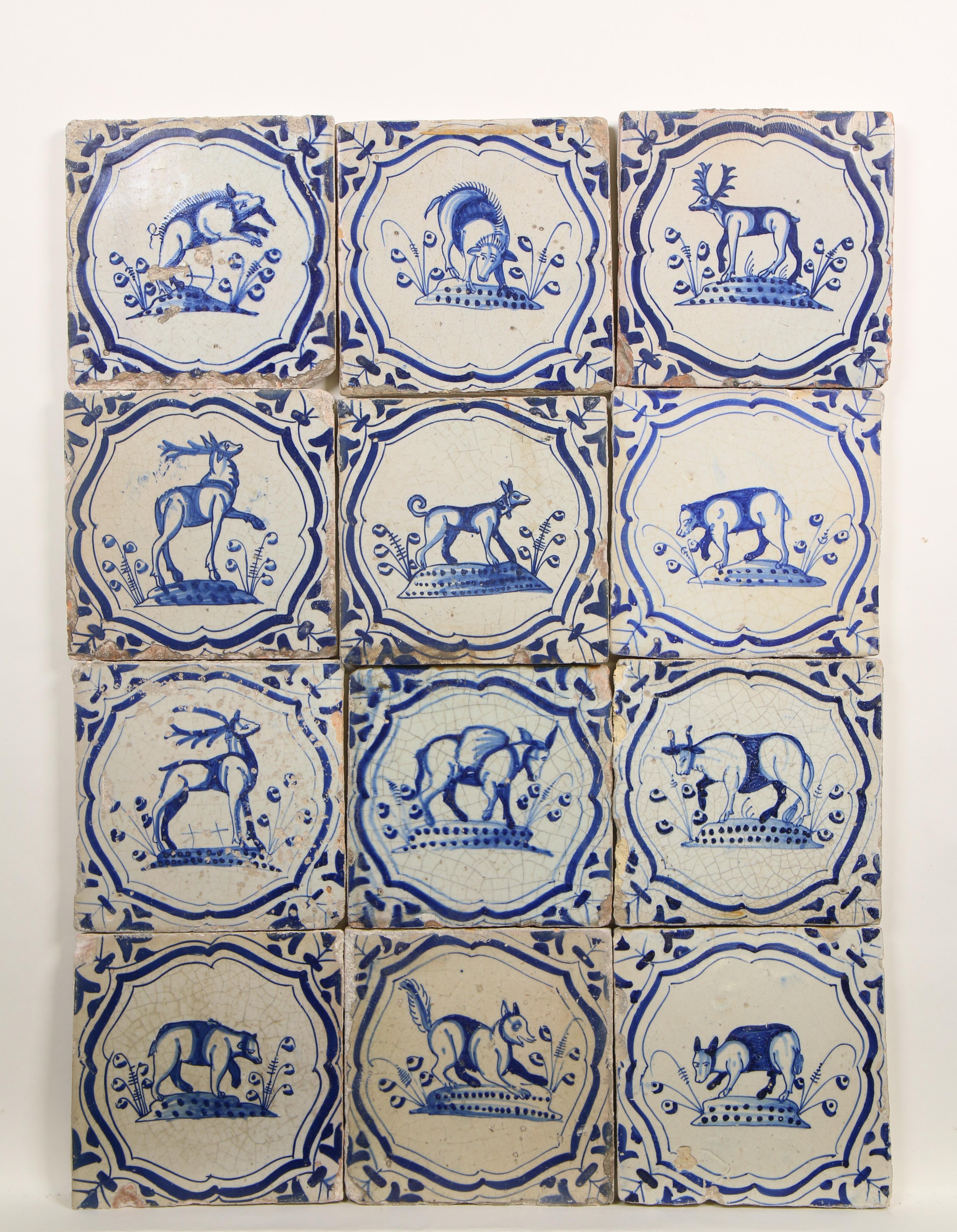 Twaalf blauw aardewerk dierendecor tegels, 1625-1650;