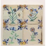 Vier polychroom aardewerk bloemendecor tegels, ca. 1620-1650;