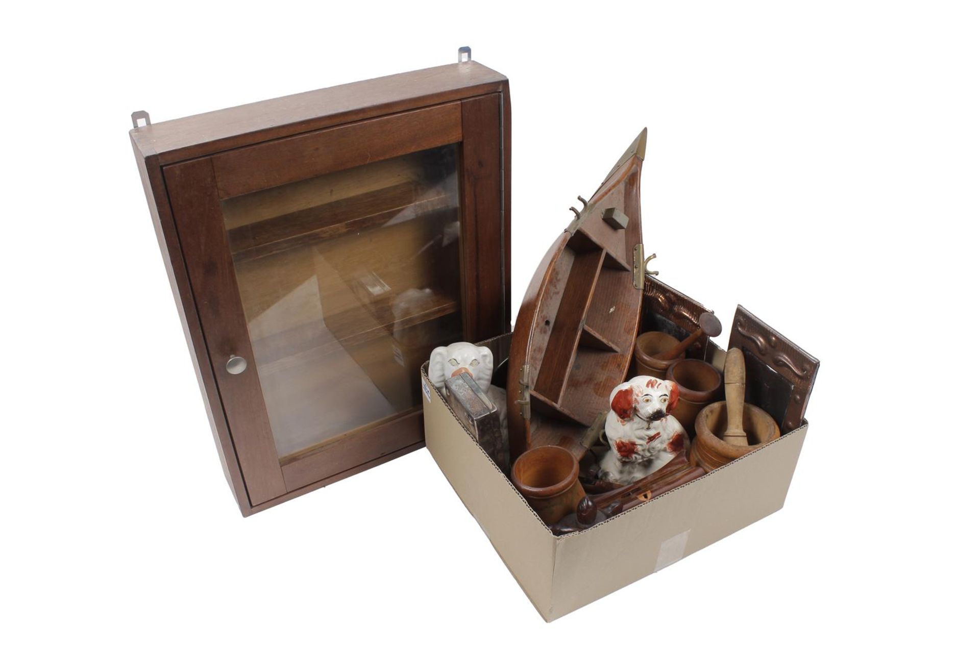 Box with window dogs, wooden pots, part of a wooden boat