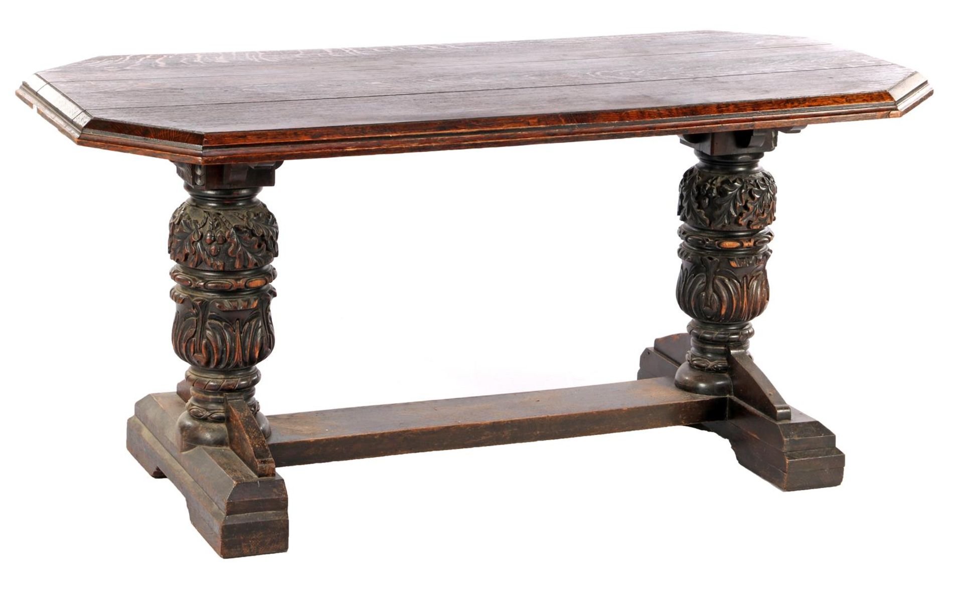 Oak monastery table with richly decorated legs