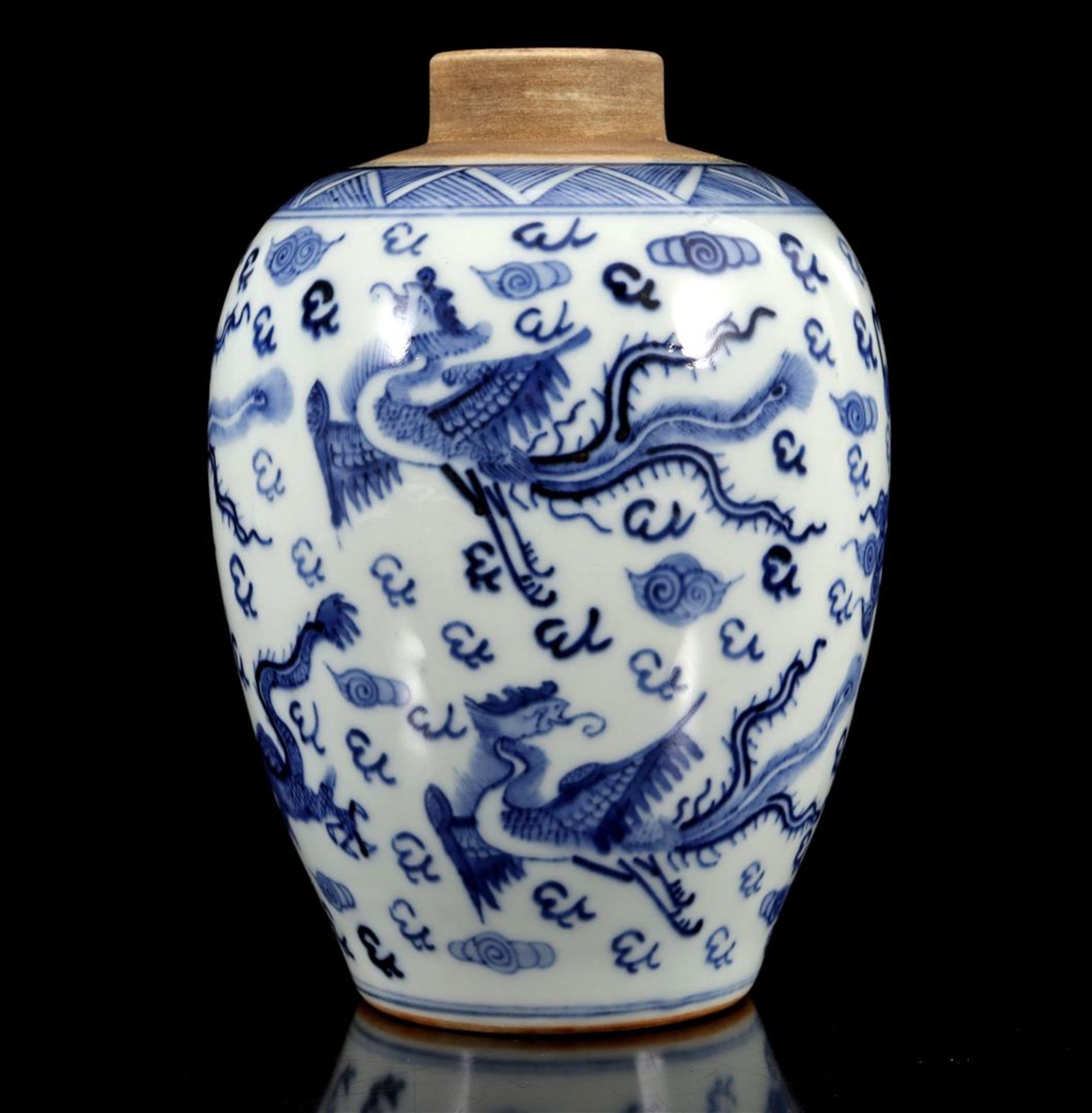 Porcelain vase with blue dragon decoration